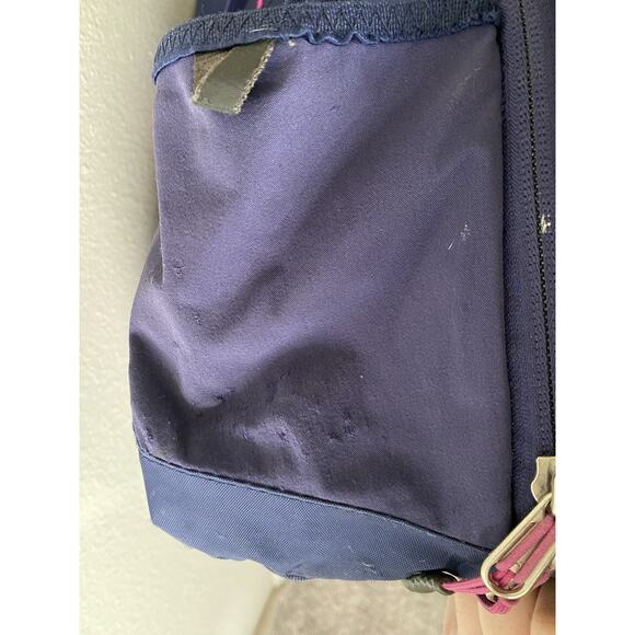 The North Face Surge Navy Blue & Pink Multi Compartment Commuter Laptop Backpack